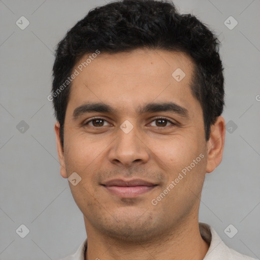 Joyful latino young-adult male with short  black hair and brown eyes