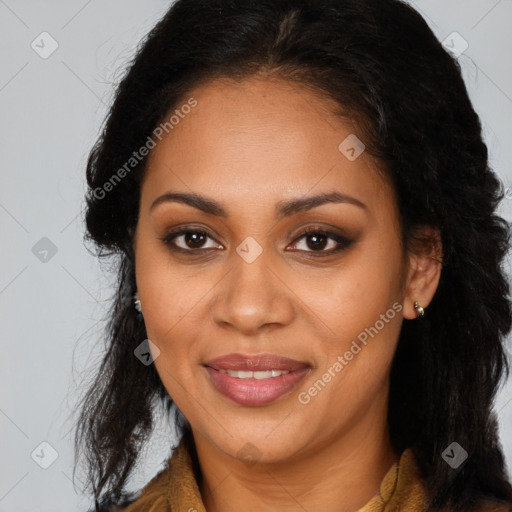 Joyful black young-adult female with long  brown hair and brown eyes