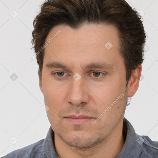 Neutral white adult male with short  brown hair and brown eyes