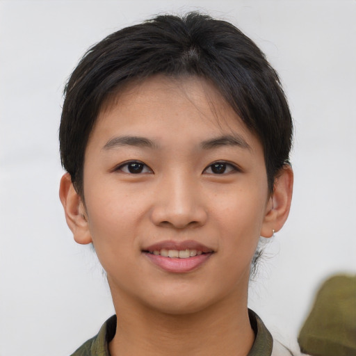 Joyful asian young-adult female with short  brown hair and brown eyes