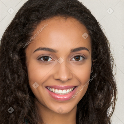 Joyful latino young-adult female with long  brown hair and brown eyes