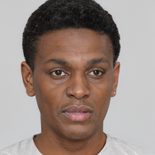 Neutral black young-adult male with short  black hair and brown eyes