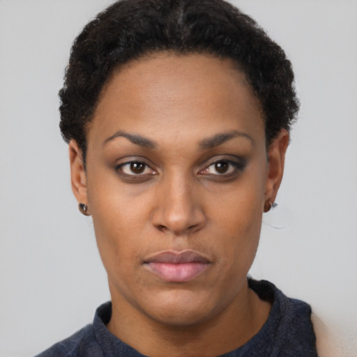 Neutral black young-adult female with short  black hair and brown eyes