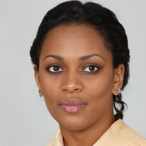 Neutral black young-adult female with short  black hair and brown eyes