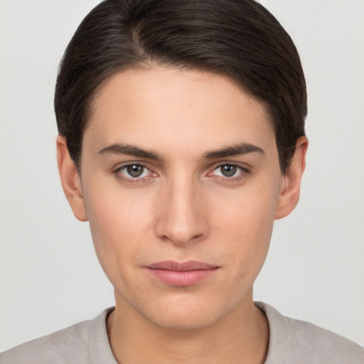 Neutral white young-adult female with short  brown hair and brown eyes