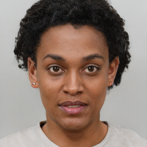 Neutral black young-adult female with short  black hair and brown eyes