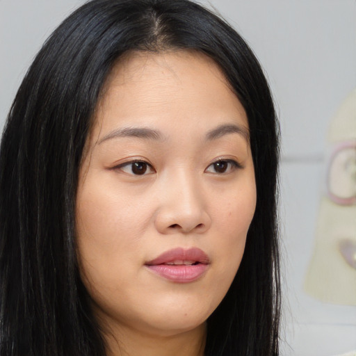 Neutral asian young-adult female with long  brown hair and brown eyes