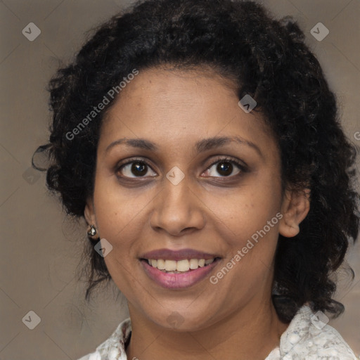 Joyful black young-adult female with medium  black hair and brown eyes