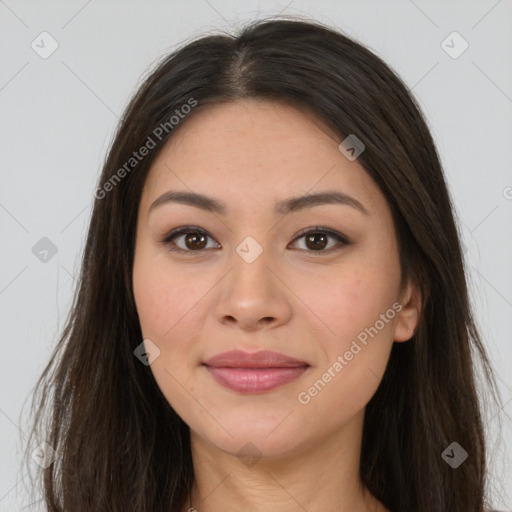 Joyful asian young-adult female with long  brown hair and brown eyes