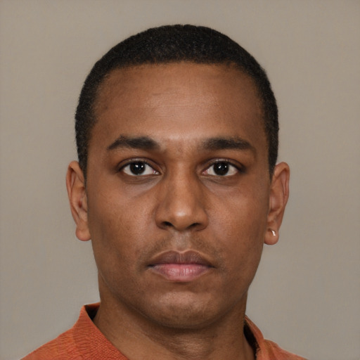Neutral latino young-adult male with short  brown hair and brown eyes