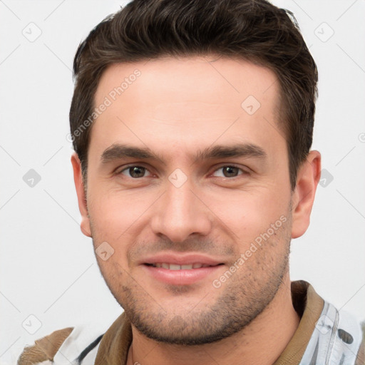 Joyful white young-adult male with short  brown hair and brown eyes