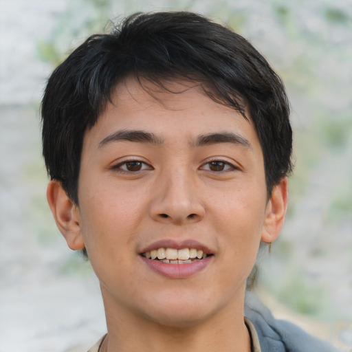 Joyful asian young-adult male with short  brown hair and brown eyes