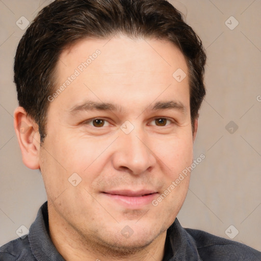 Joyful white adult male with short  brown hair and brown eyes