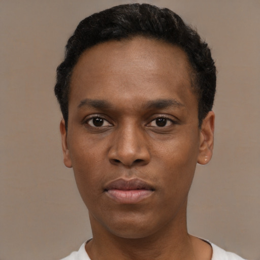 Neutral black young-adult male with short  black hair and brown eyes