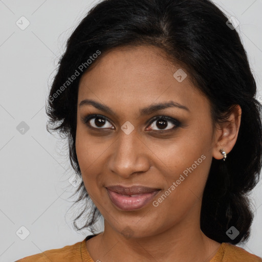 Joyful black young-adult female with medium  brown hair and brown eyes