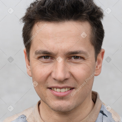 Joyful white adult male with short  brown hair and brown eyes