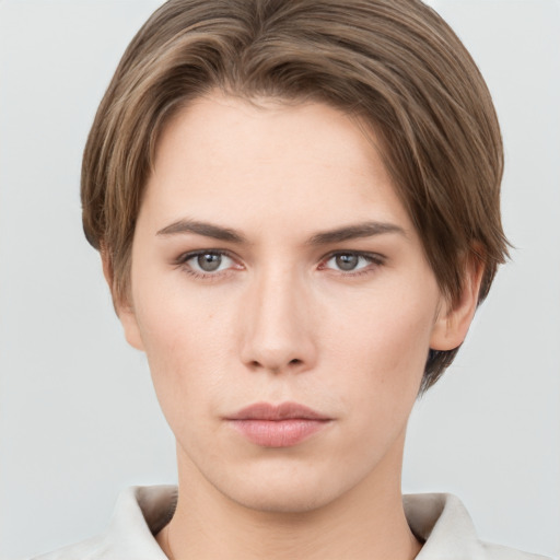 Neutral white young-adult female with short  brown hair and grey eyes