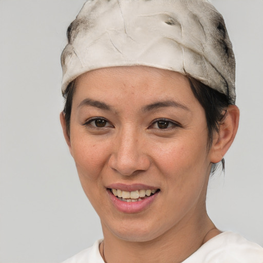 Joyful white young-adult female with short  black hair and brown eyes