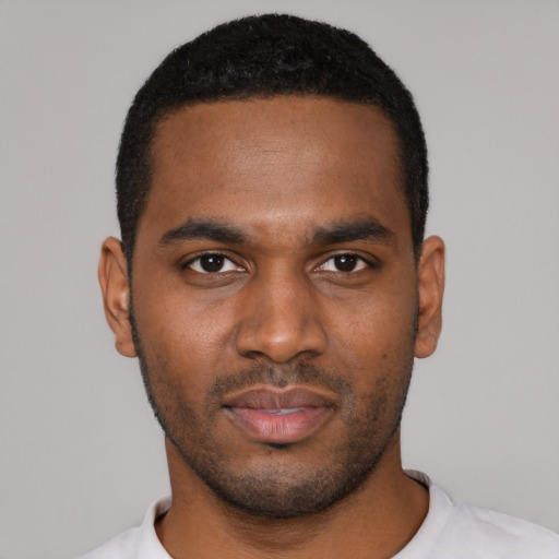 Neutral black young-adult male with short  black hair and brown eyes