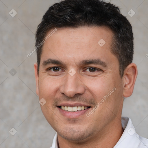 Joyful white young-adult male with short  brown hair and brown eyes