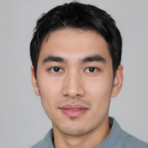 Neutral asian young-adult male with short  black hair and brown eyes