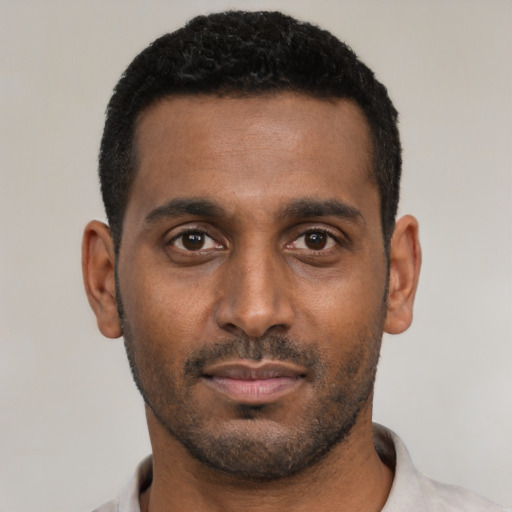 Neutral black young-adult male with short  black hair and brown eyes