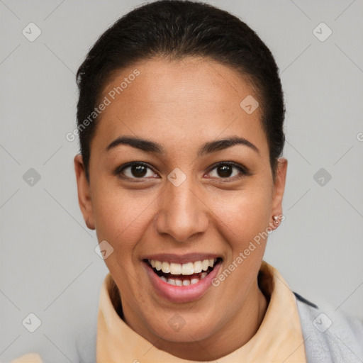 Joyful latino young-adult female with short  brown hair and brown eyes