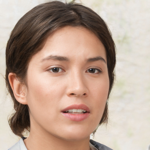 Neutral white young-adult female with medium  brown hair and brown eyes