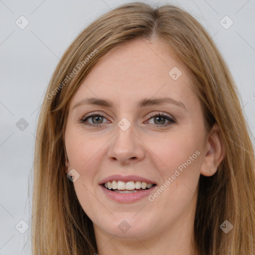 Joyful white young-adult female with long  brown hair and grey eyes