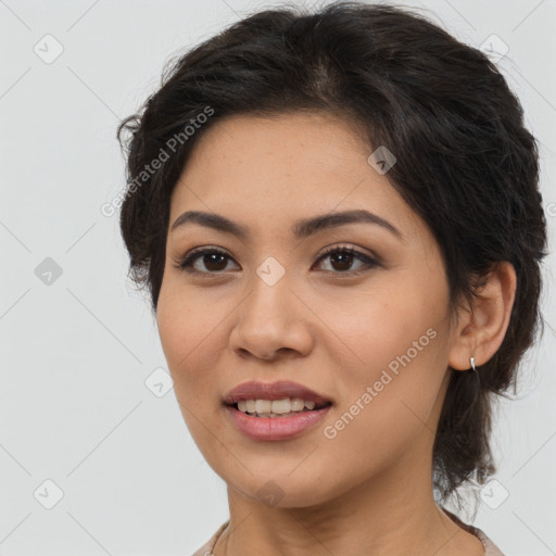 Joyful asian young-adult female with long  brown hair and brown eyes