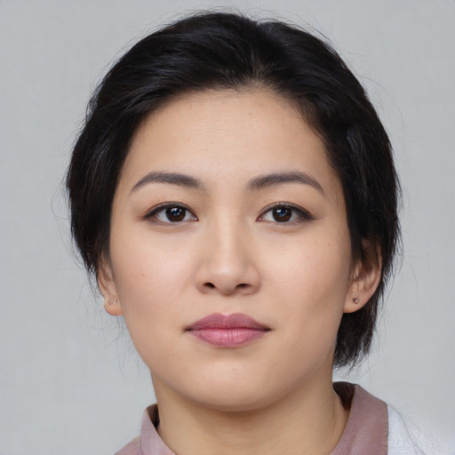 Neutral asian young-adult female with medium  black hair and brown eyes