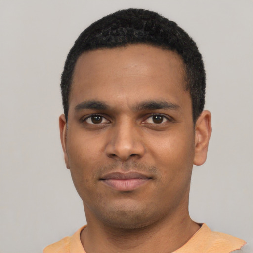Neutral black young-adult male with short  black hair and brown eyes