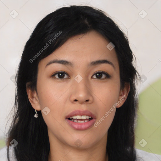 Joyful latino young-adult female with medium  black hair and brown eyes