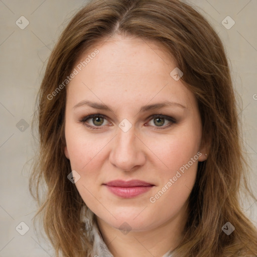 Joyful white young-adult female with long  brown hair and green eyes