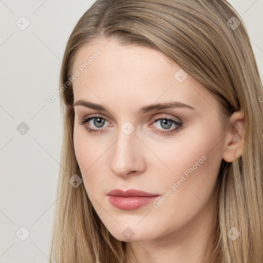 Neutral white young-adult female with long  brown hair and brown eyes