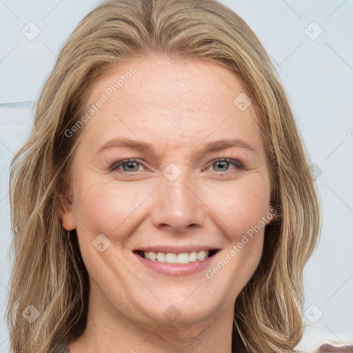 Joyful white young-adult female with long  brown hair and grey eyes