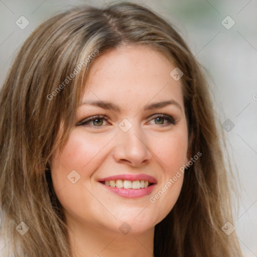 Joyful white young-adult female with long  brown hair and green eyes