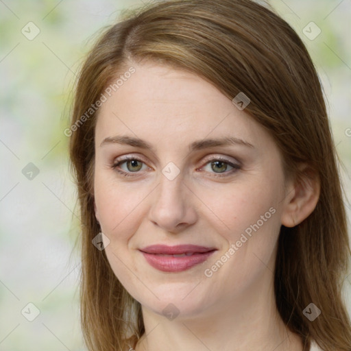 Joyful white young-adult female with medium  brown hair and green eyes