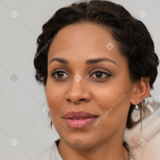 Joyful black young-adult female with medium  brown hair and brown eyes