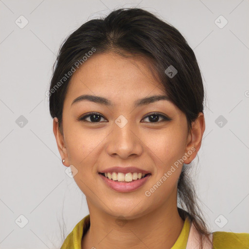 Joyful asian young-adult female with short  brown hair and brown eyes