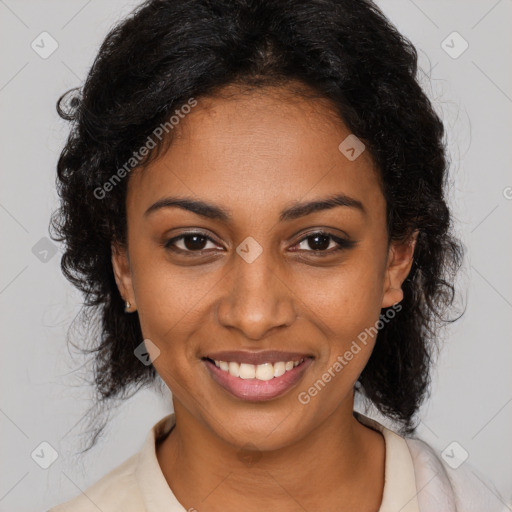 Joyful black young-adult female with medium  brown hair and brown eyes