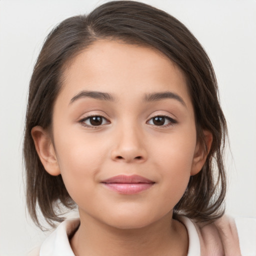 Joyful white child female with medium  brown hair and brown eyes