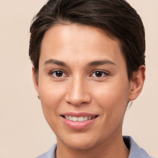 Joyful white young-adult female with short  brown hair and brown eyes