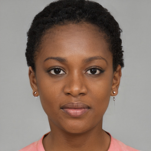 Neutral black young-adult female with short  brown hair and brown eyes