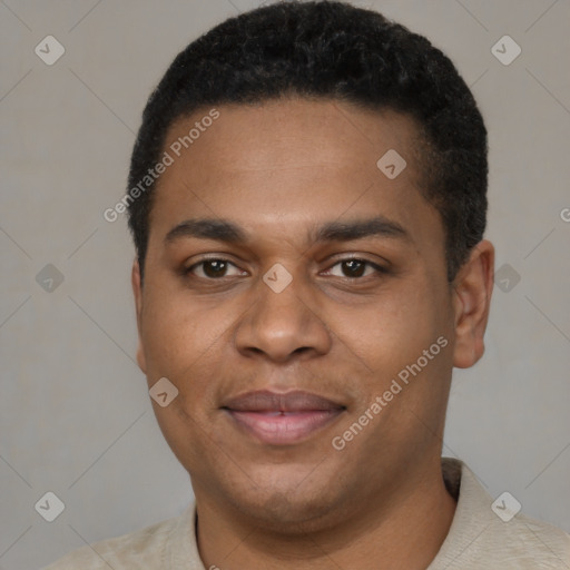 Joyful black young-adult male with short  black hair and brown eyes