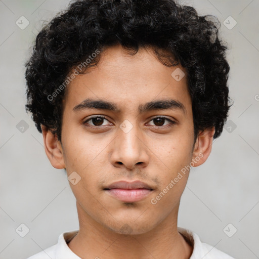 Neutral latino young-adult male with short  brown hair and brown eyes