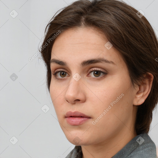 Neutral white young-adult female with medium  brown hair and brown eyes