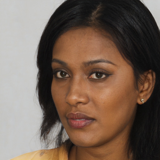 Neutral asian young-adult female with long  brown hair and brown eyes