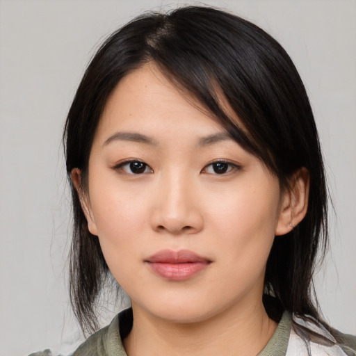 Neutral asian young-adult female with medium  black hair and brown eyes