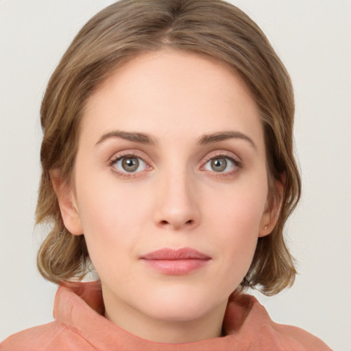 Neutral white young-adult female with medium  brown hair and green eyes